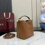 Gucci GG Emblem small bucket bag 815118 in brown leather