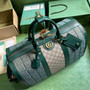 Gucci 724642 Mini GG canvas small duffle bag in Green leather