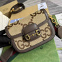 Gucci ‎658574 Horsebit 1955 jumbo GG mini bag Camel and ebony jumbo GG canvas - Default Title - View 1