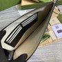 Gucci �?75317 GG Marmont leather pouch black leather silver