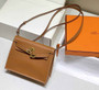 Hermès Kelly Danse II brown Evercolor leather with gold - Default Title - View 1