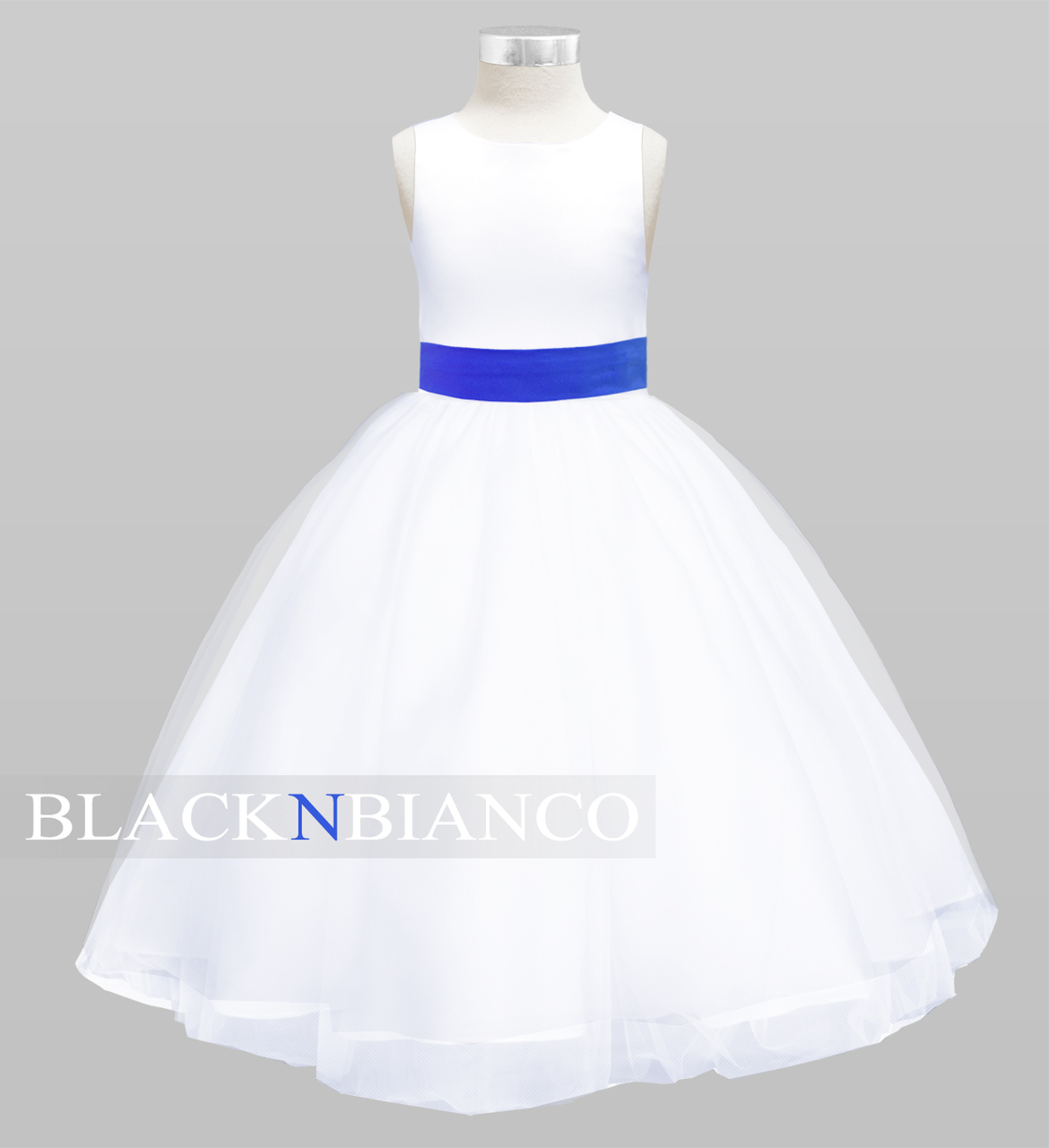 white flower girl dress with purple sash