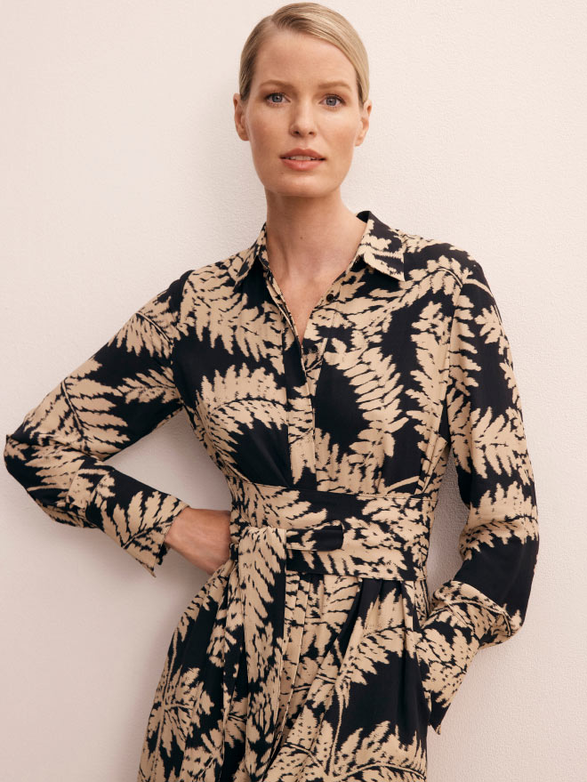 Model wearing sand fern print Sirolo dress