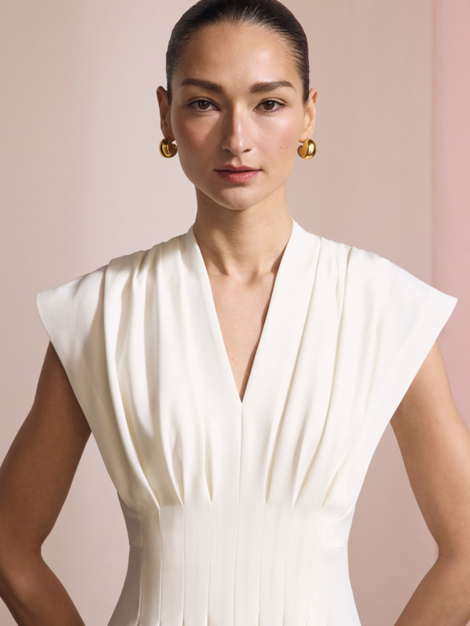 Model wearing Clever Crepe ivory Tivoli blouse