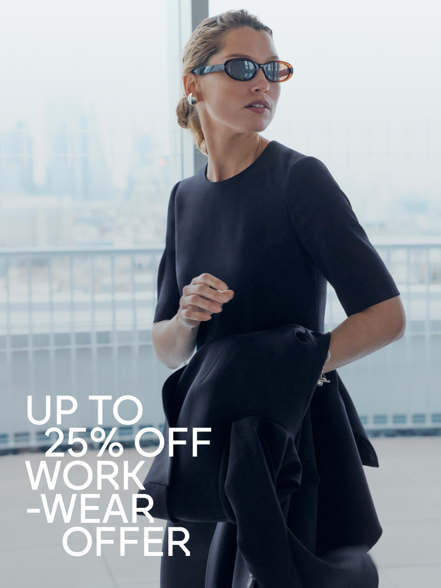 Model wearing navy Lovera dress
