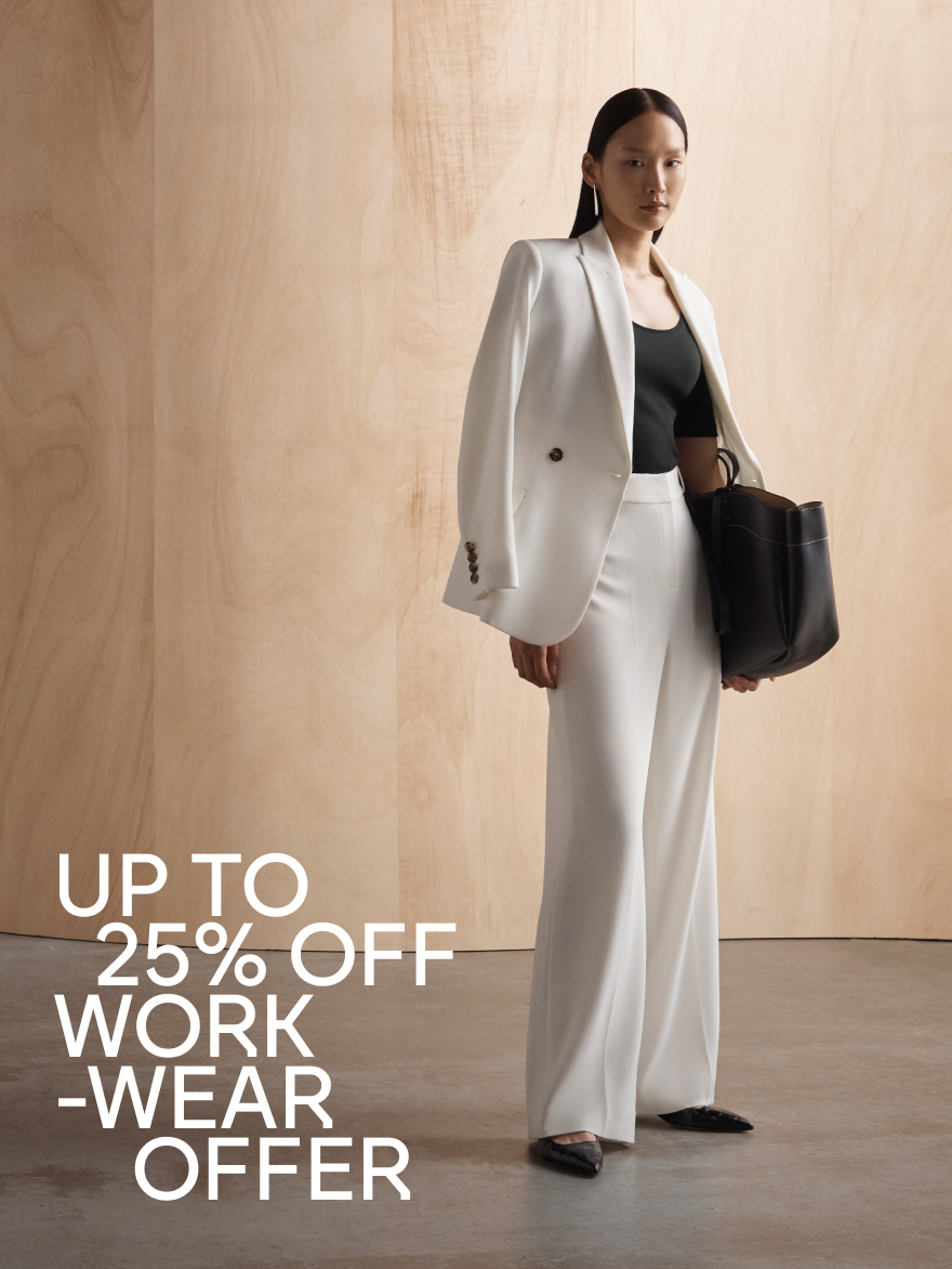 Model wearing ivory Clever Crepe suiting