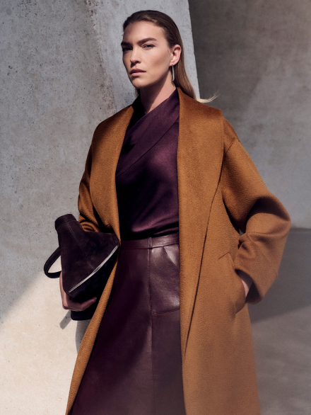 Model wearing camel Berkeley coat