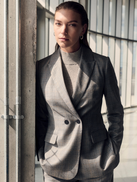 Model wearing new Prince of Wales grey tailoring