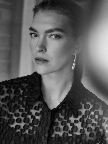 Model wearing black Delvino blouse