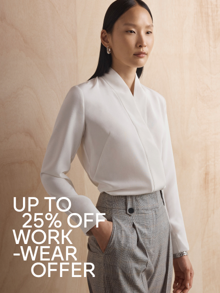 Model wearing ivory Bowery blouse