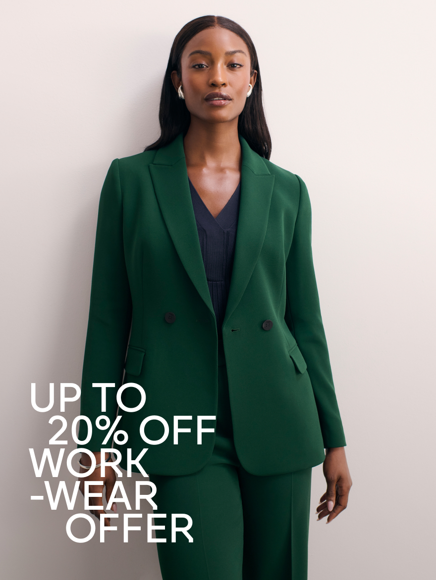 Model wearing forest green suiting