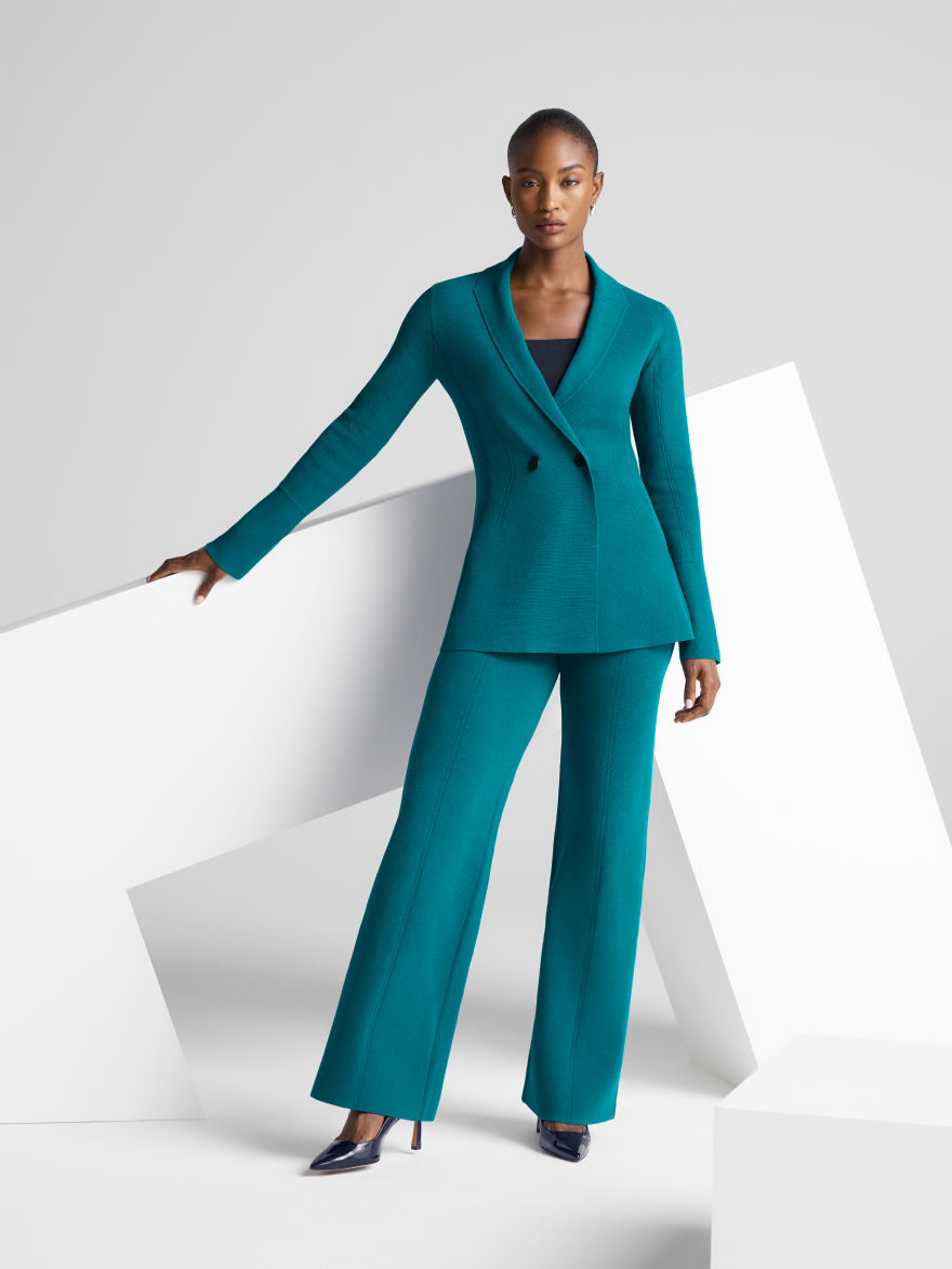Model wearing teal suiting