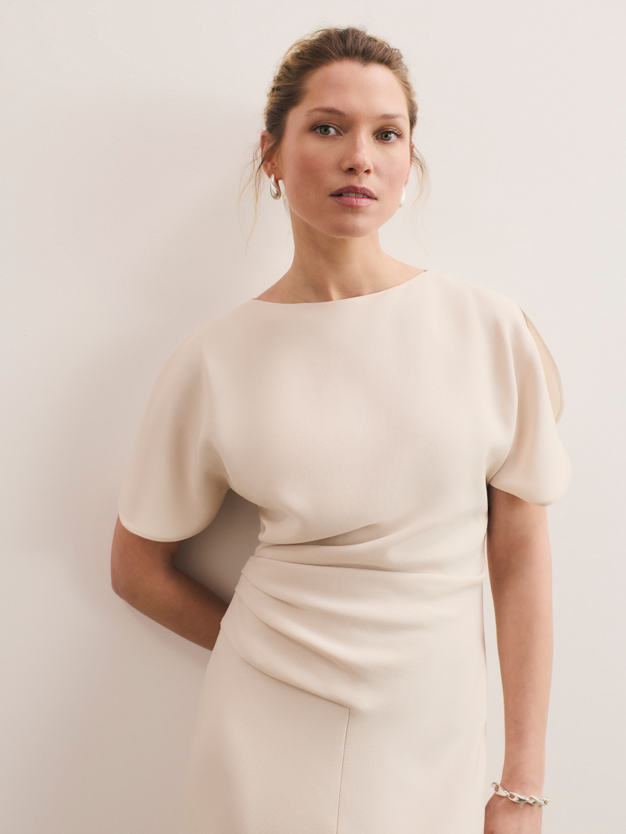 Model wearing stone Salerno dress