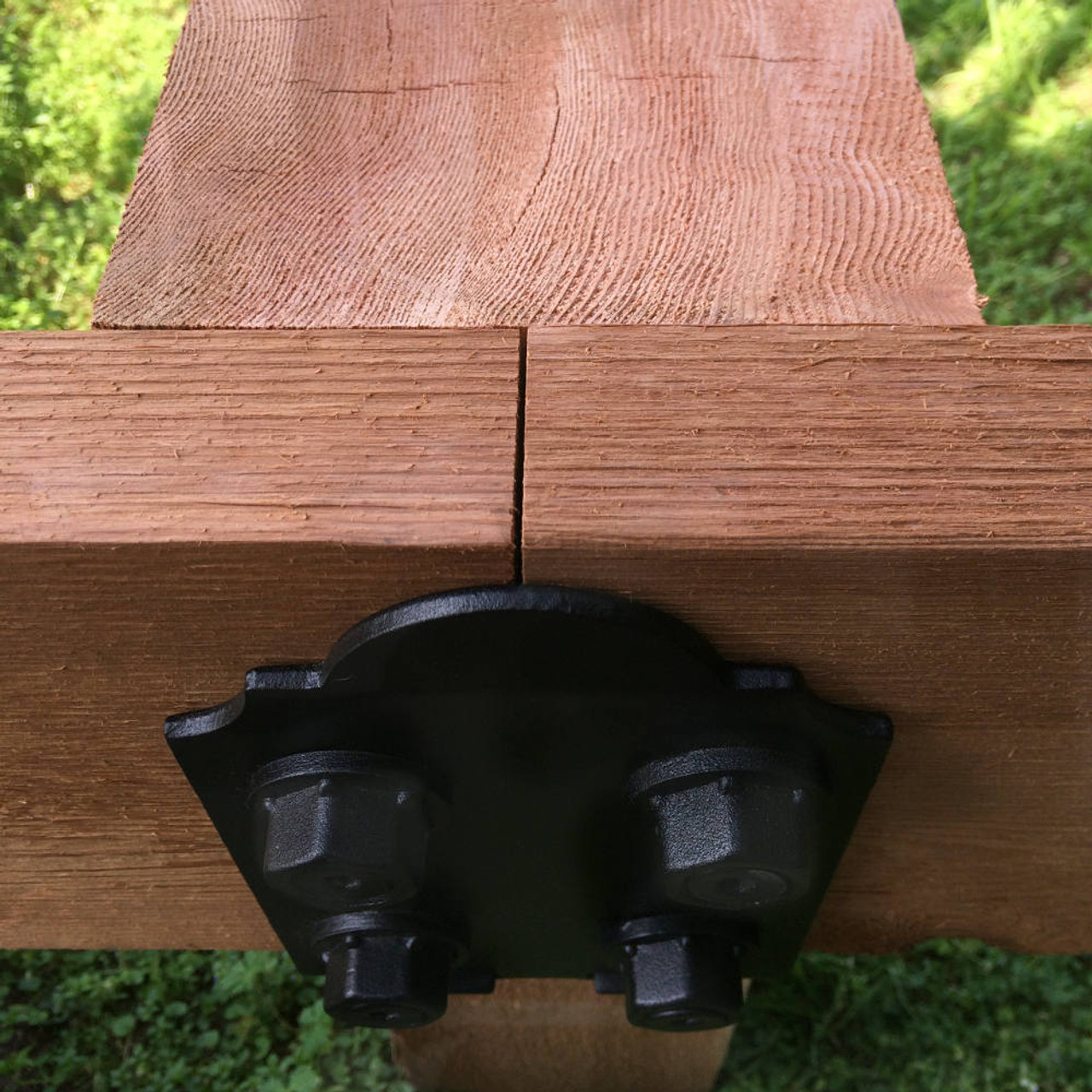 Two Beams Joined to a Post with the 8" Laredo Sunset Post to Beam Coupler from OZCO Building Products