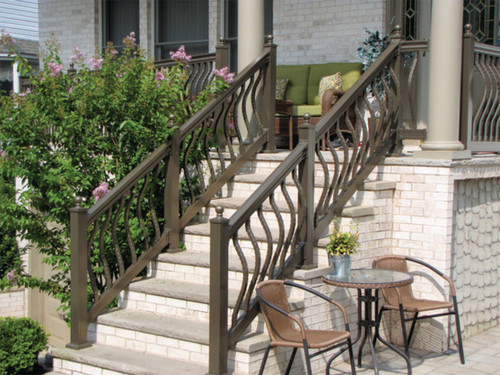 Key-Link Lancaster Series Aluminum Stair Railing Sections on Outdoor Stairs - Bronze with Hammered Bowed Balusters