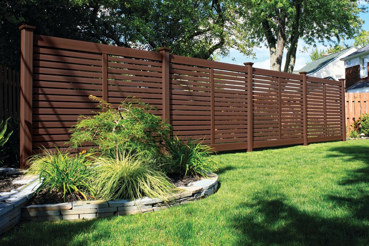 Catalyst Vinyl Fence in TimberGrain