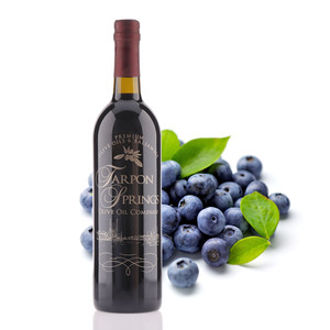 A 750mL bottle of Tarpon Springs Wild Blueberry Dark Balsamic Vinegar