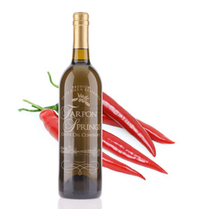 A 750mL bottle of Tarpon Springs Red Cayenne Chili Fused Olive Oil A 750mL bottle of Tarpon Springs Red Cayenne Chili Fused Olive Oil