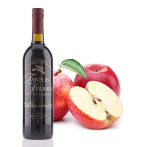 A 750mL bottle of Tarpon Springs Red Apple Dark Balsamic Vinegar A 750mL bottle of Tarpon Springs Red Apple Dark Balsamic Vinegar
