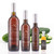 Pictured are four different size bottles of the Suyo Cucumber white balsamic.