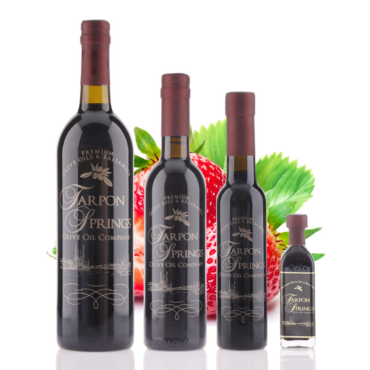 Four different size bottles of Tarpon Springs Strawberry Dark Balsamic Vinegar