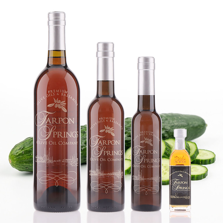 Pictured are four different size bottles of the Suyo Cucumber white balsamic.