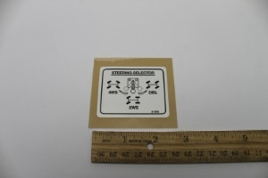 Genie Lift Part # 2-1345GT - DECAL, STEERING SELECTOR, EA