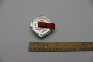 Genie Lift Part # 23061GT - CAP,RADIATOR,13 PSI, EA
