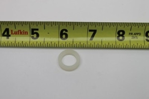 Genie Lift Part # 54692GT - SPACER,NYLON,.718 X .526 X.219, EA