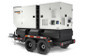 Side view of the Generac 150kVA prime power diesel generator, mounted securely on a tandem axle trailer, with an aluminum, rust-proof enclosure designed for quiet operation.