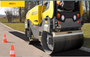 Close-up of the 100cm front drum on the RD24-100, highlighting the smooth drum surface and robust vibration system.