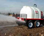 Rear view of the Multiquip WT8HP water trailer, showing the high-pressure discharge outlets and trailer lights.