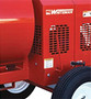 Convenient, easy operating engine engagement lever.
Thick tubular steel reinforced frame resists damage, provides superior
strength and proper dumping clearance.