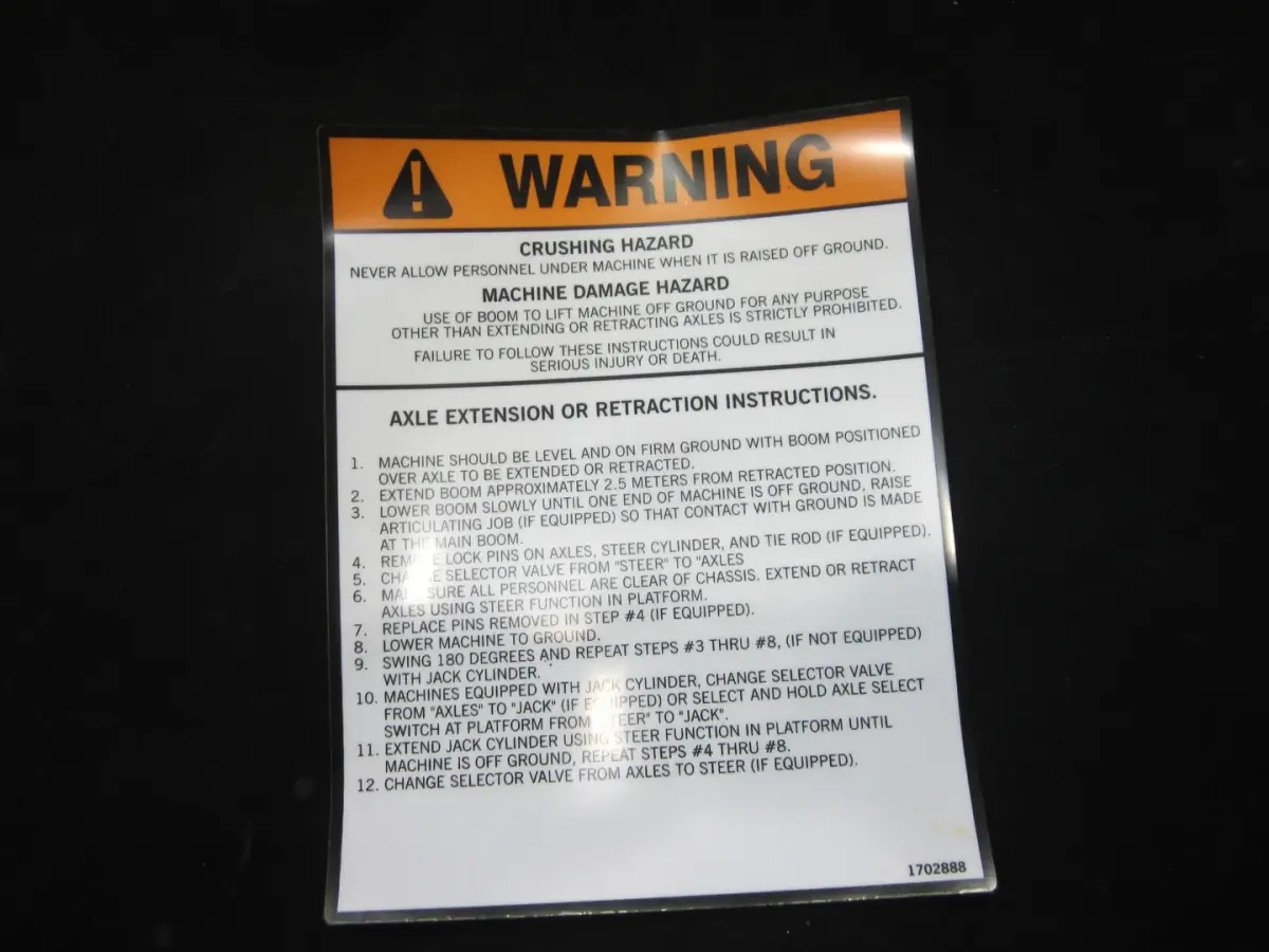 JLG Part # 1702888 | DECAL, WARNING (AXLE EXT/RET), EA