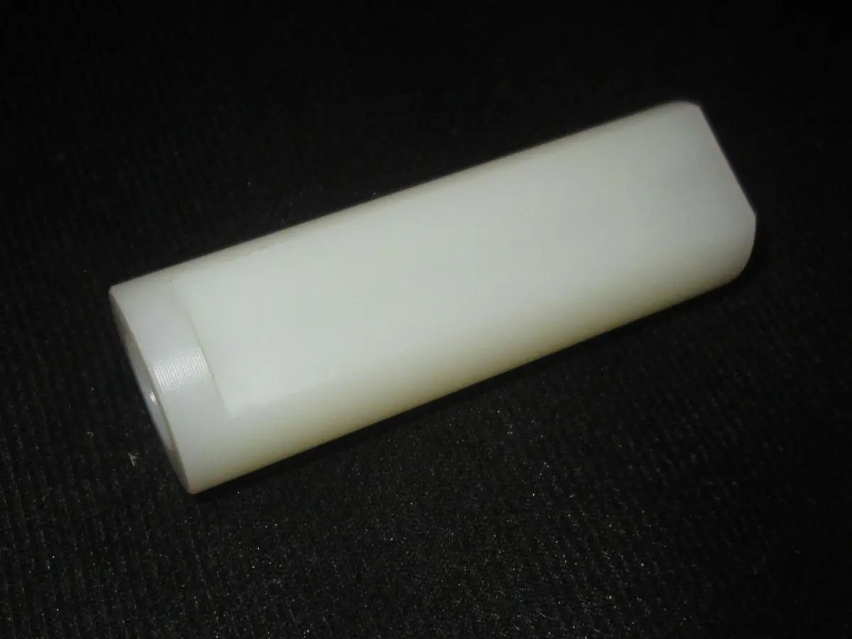 JLG Part # 4567203 | TUBE,.60X1.11X3.38 NYL 101 NAT, EA