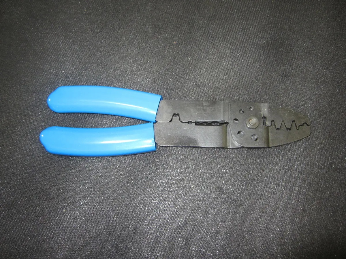 JLG Part # 7002821 | CRIMPER, WIRE END, EA