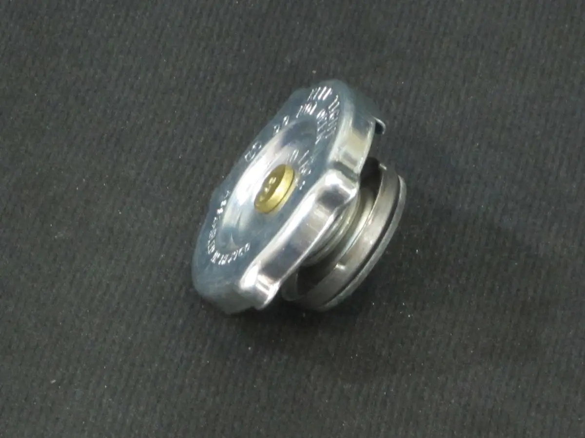 JLG Part # 7026442 - CAP, RADIATOR (10 PSI), EA, subs to 8180318