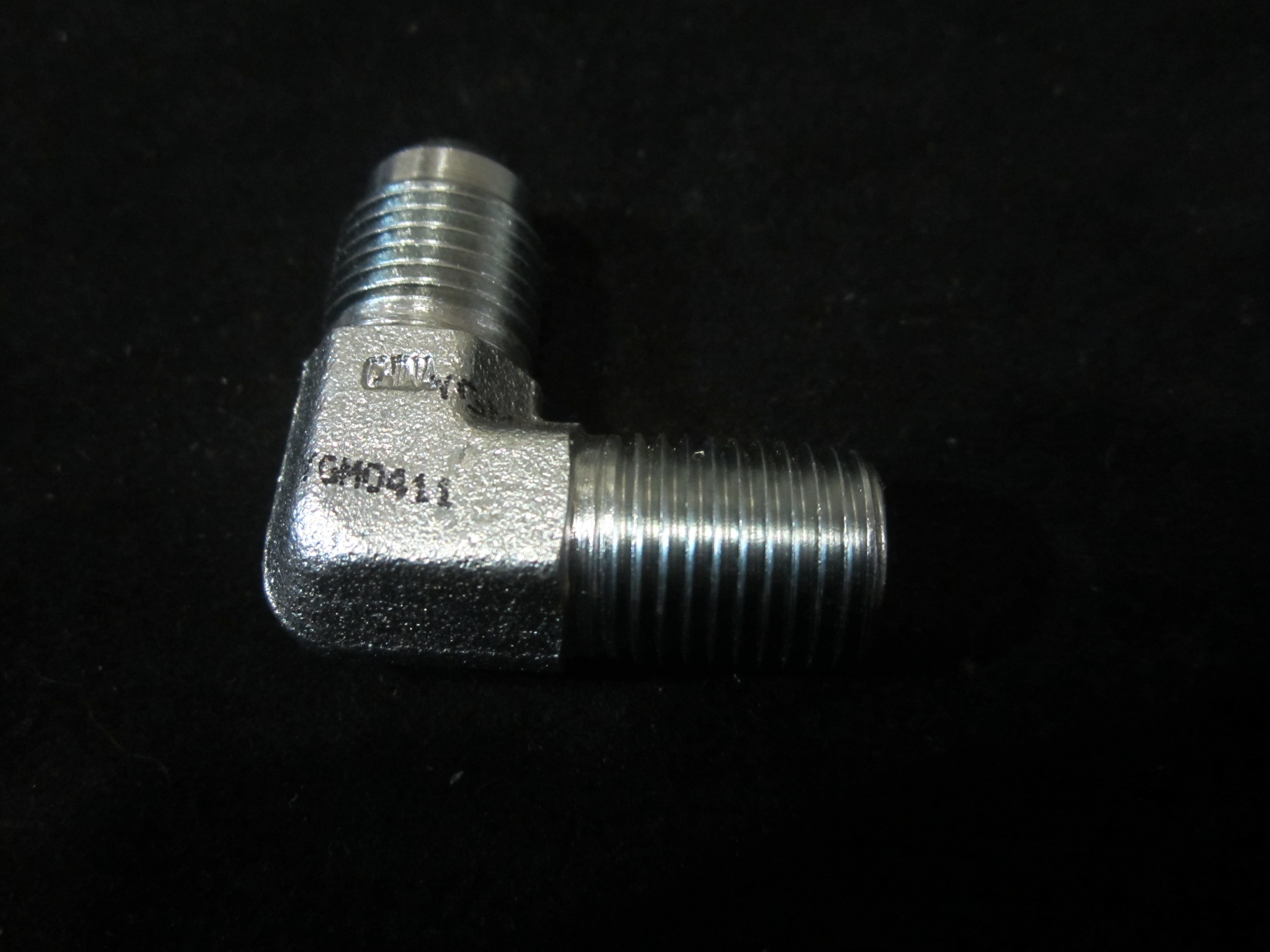 JLG Part # 2220773 | ADPT,90 S JIC/NPTF 6-4 FG, EA