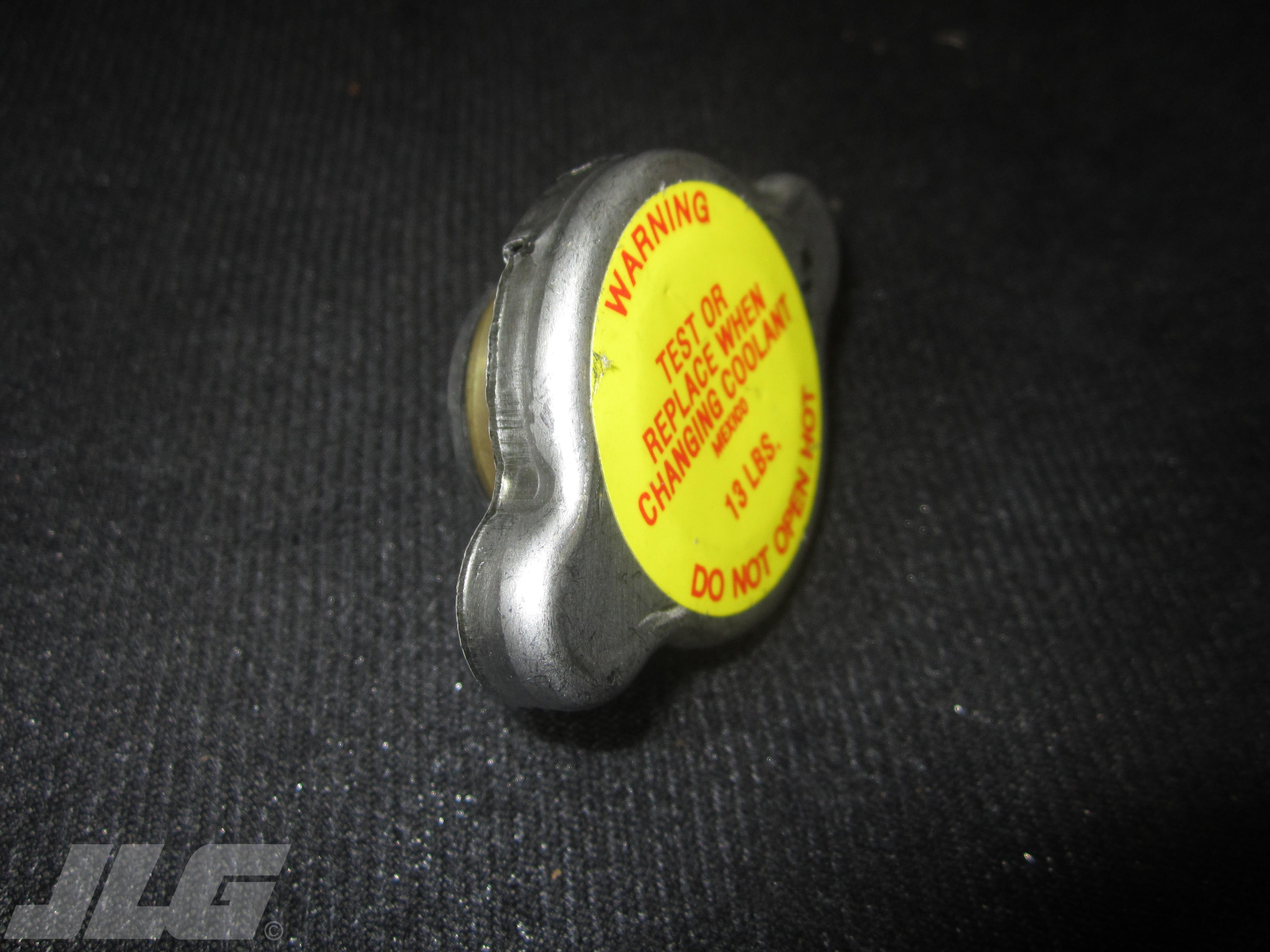 JLG Part # 8180311 - CAP RADIATOR 13 PSI, EA