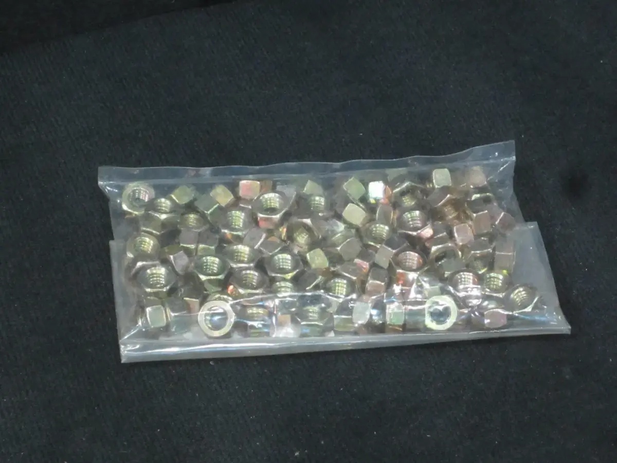 JLG Part # UP011250-005 | UP-HX NUT .312PK100, PK