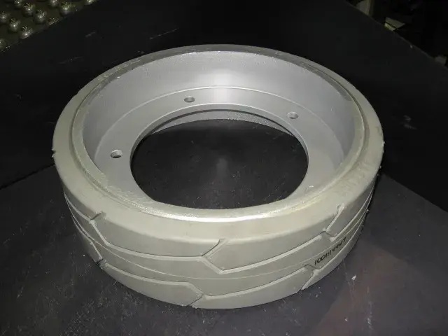 JLG Part # 1001114467 | TIRE,100X323 (NON-MARKING), EA