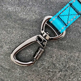 The Wolf & I Co. Co-Pilot Car Seatbelt features a swivel carabiner clip to attach to your dogs harness.