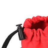 Wolf & I Co.'s red dog poop bag holder easily secures with a toggle to keep your dog waste bags and accessories safe.