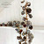 Whitewashed Pine Cone Garland with Rusty Bells