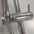 Minimalistic shower rail, shower head, hose, chromed brass