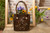 Hide and Chic Shop tooled leather Conchita handbag
Style #410 Honey
Shoulder bag
Purse