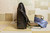 Hide and Chic Shop tooled leather Lorenzo laptop messenger bag
Style #215 Black
Shoulder bag
Luggage
Side view