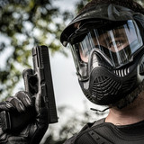 paintball player with T4E Glock G17 Gen5 paintball marker wearing Valken paintball goggles