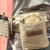 Valken folding dump pouch in tan on molle battle belt