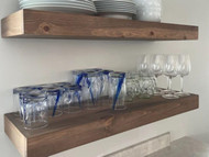 Can floating shelves hold glasses and dishes?